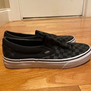 Black checkered slip on vans